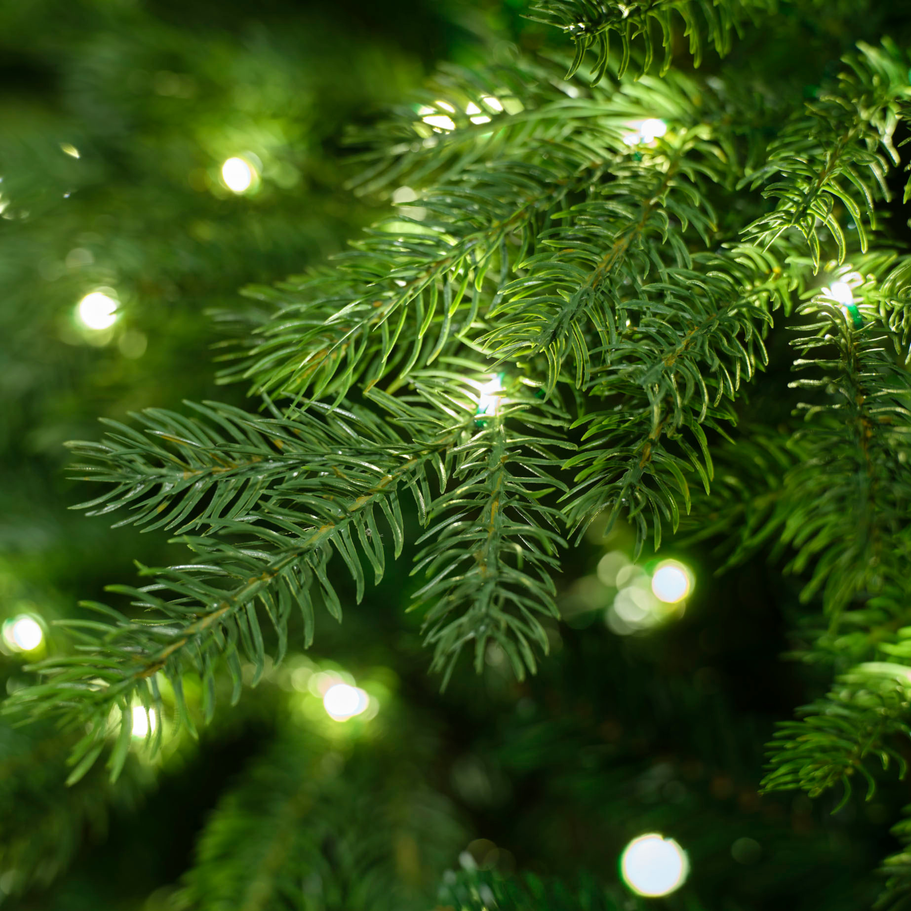 Künstlicher Weihnachtsbaum 180cm - 240cm mit integrierter Lichterkette - Nordmanntanne wie echt!